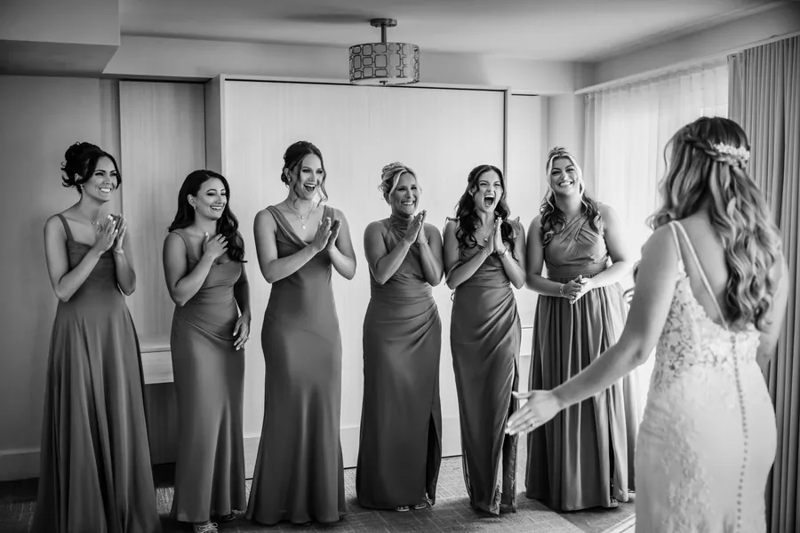 Bridesmaids reacting to their first look at the bride at The Allegria Hotel &mdash; George Pompilio Photography