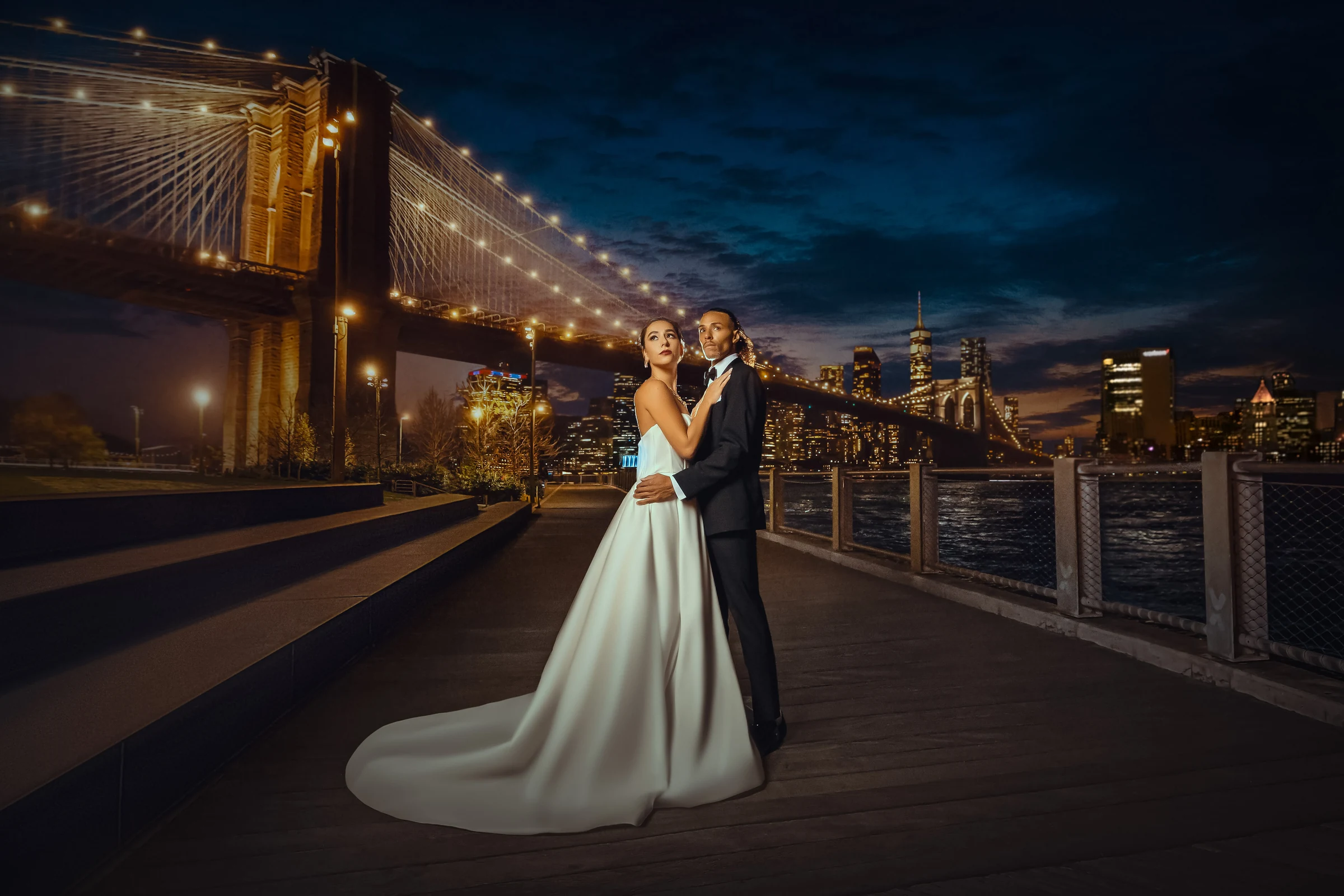 Bride and groom night portrait at Brooklyn Bridge with NYC skyline — George Pompilio Photography