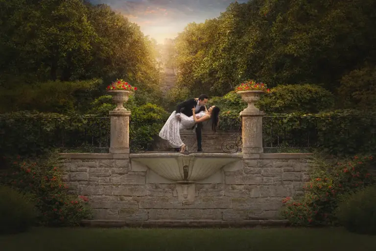 Waterfront skyline sunset wedding portrait by George Pompilio