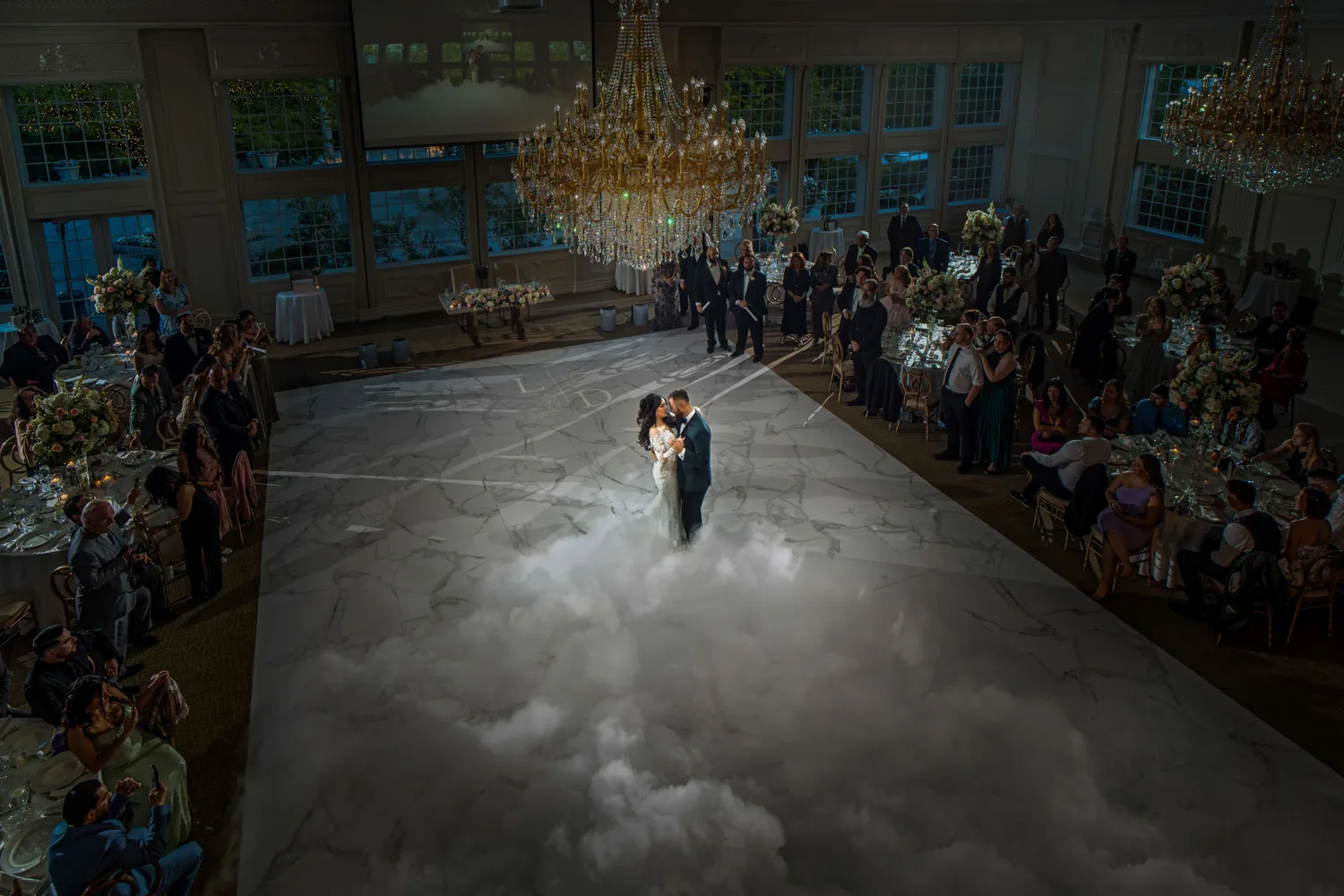First dance on low fog beneath the chandeliers at the Estate at Florentine Gardens &mdash; George Pompilio Photography