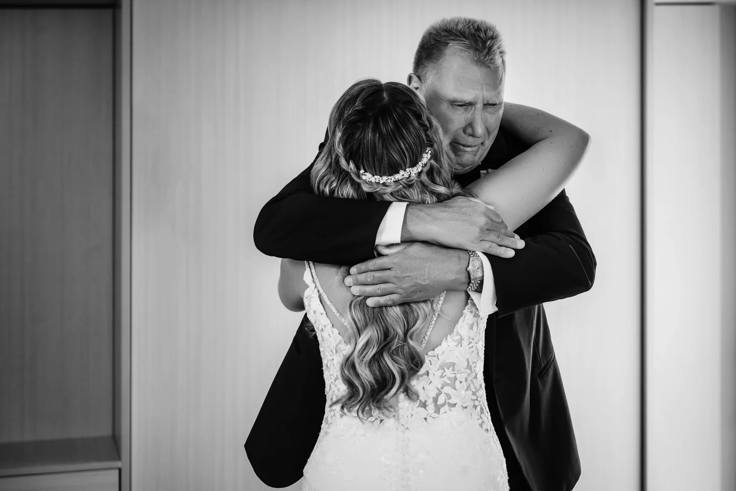 Black and white embrace between Allison and her father on the wedding morning &mdash; George Pompilio Photography