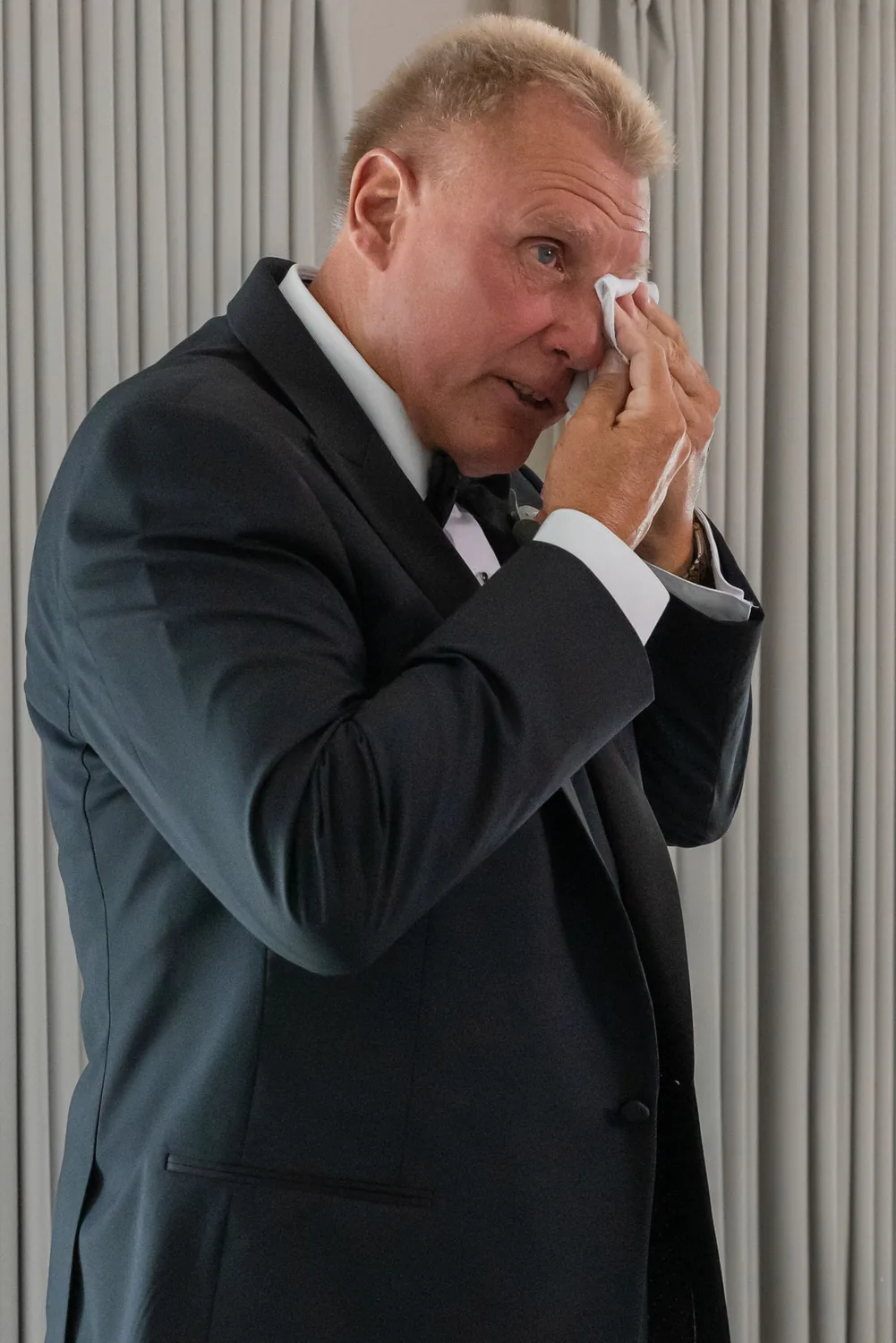 Allison&rsquo;s father wiping away a tear after seeing her in her wedding gown &mdash; George Pompilio Photography