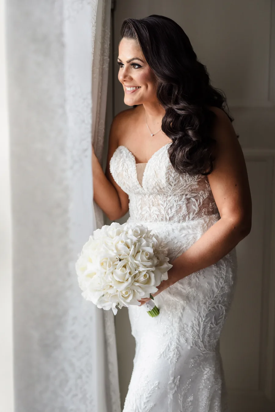 Bride with bridal hair and makeup by Kate Ford Beauty at Glen Cove Mansion