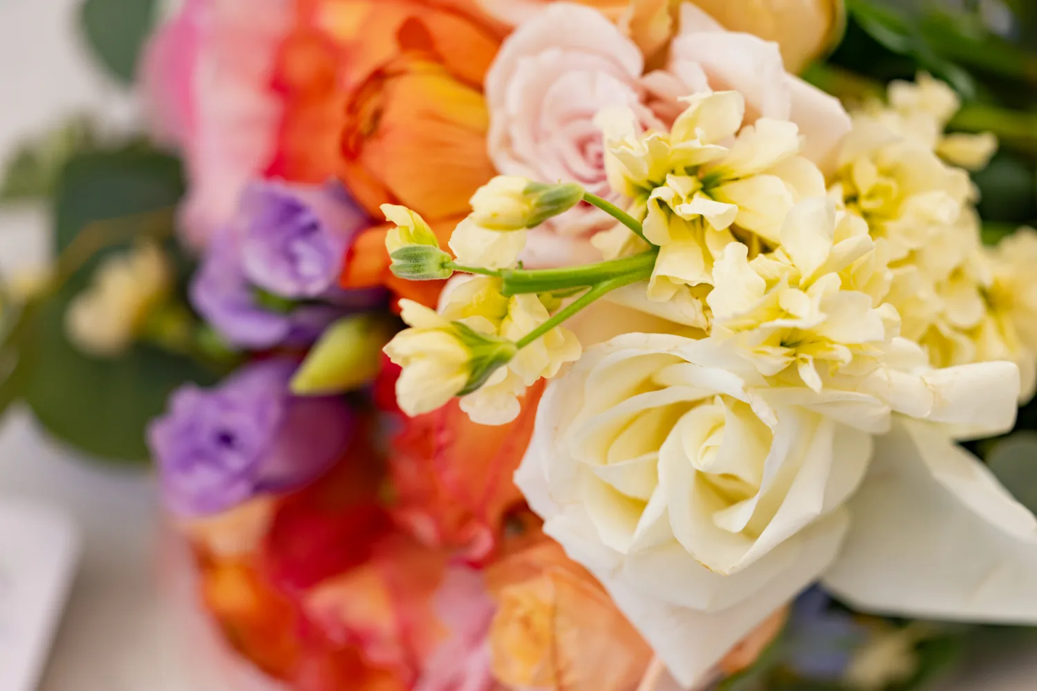 Chelsea and Ryan&rsquo;s wedding: Close-up of the bride's colorful bouquet, Larkfield wedding &mdash; George Pompilio Photography