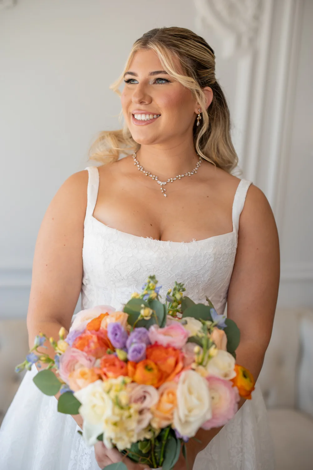 Chelsea and Ryan&rsquo;s wedding: Bridal portrait in natural window light with bouquet at Larkfield &mdash; George Pompilio Photography