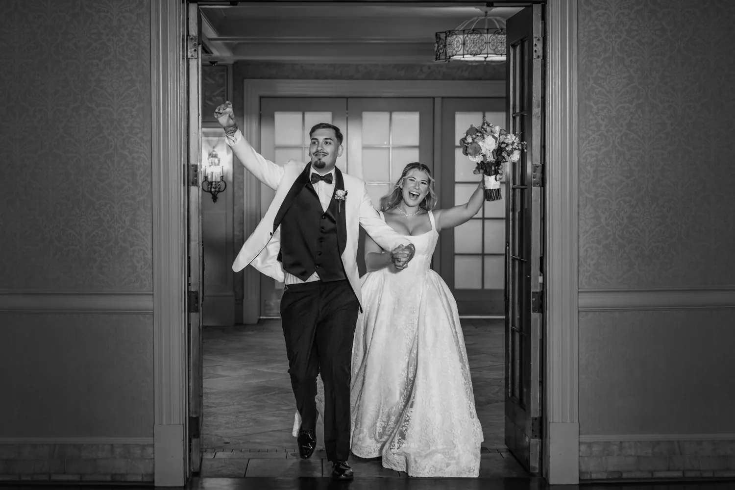 Chelsea and Ryan&rsquo;s wedding: Black and white grand entrance into the reception at Larkfield &mdash; George Pompilio Photography